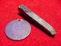 silver tag and brass spike.webp