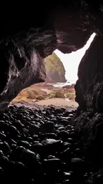 COBBLE CAVE AT NORTH AGATE BEACH.webp