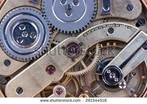 stock-photo-details-clockwork-old-clock-closeup-281544518.jpg