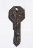 key shaped religious item.webp