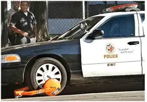 Police Car with wheel lock.webp