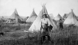 Pine_Ridge_Agency,_Young_Man_Afraid_of_His_Horses_and_his_tepee_taken_at,_Jan_17,_1891_(Sioux...webp