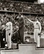 Jesse-Owens-wins-gold-in-Nazi-Germany-1936-839x1024.jpg