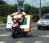 Flat-screen-TV-on-moped-because-delivery-charges-are-too-high.jpg