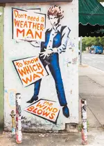 42181211-AUSTIN-TXUSA-APRIL-11-2015-Mural-depicts-Bob-Dylan-s-lyrics-Don-t-need-a-weatherman-...webp