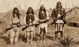 geronimo_and_his_warriors_before_surrender_1886.webp