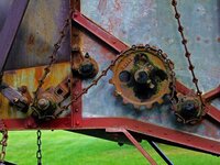 chain_and_gear_system_on_antique_harvester.jpg