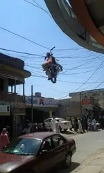 motorcycle-in-overhead-powerlines.webp