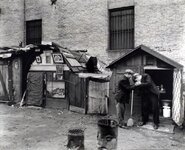 Huts_and_unemployed,_West_Houston_and_Mercer_Street,_Manhatt_-_(3109787453).jpg