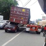 shiping-container-fallen-on-car.jpg