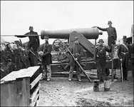 photo_grapeshot_cannister_shell_4thNYheavyartilleryguncrew_L.webp