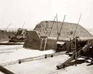 photo_Fort-Marshall_rifled&banded-RefWar-British-12pounder_with-grapeshot_Sullivans-Island.webp