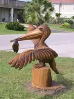 pelican wood carving.webp