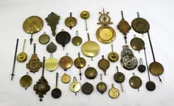 clock-pendulums_group_Ebay_s-l1600.webp