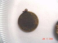 Insurancemedalionreverse.jpg