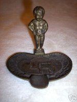 1930-s-swastika-ashtray-with-boy-peeing-brass_1_a688c61a5a3703409827302163bf7cc3.jpg