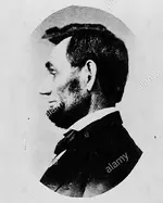 abraham-lincoln-head-and-shoulders-portrait-in-profile-facing-left-cropped-from-larger-view-P...webp