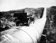 LA_Aqueduct_Car_on_Pipe.webp