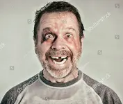 stock-photo-you-should-see-the-other-guy-a-man-who-is-apparently-happy-to-be-beaten-up-426565...webp