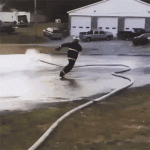 firefighter-chasing-spray-hose.gif