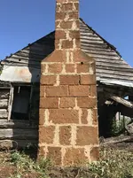 Peg Leg - Leasman cabin chimney.webp