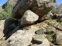 small rocks under big.webp