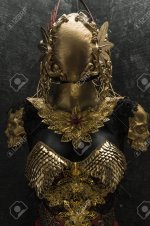 98150844-protection-gold-armor-and-metal-pieces-handmade-it-has-a-golden-breastplate-of-dragon-s.jpg