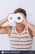 a-handsome-guy-looks-through-rolls-of-toilet-paper-and-simulating-binoculars-finding-solution...webp