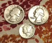 2 quarters and 1 Mercury dime.webp