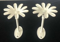 Pair-Of-Daisy-Cast-Iron-Curtain-Tie-Backs.jpg