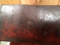 red paint axe head stamped E 003.jpg