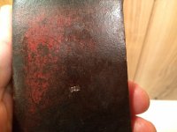 red paint axe head stamped E 004.jpg