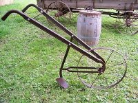 antique-steel-wheeled-garden-push_1_3489c6316eecfa4e8456ee90882069bf.jpg