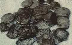 Tristan-Silver-Coins-2-Photos cave coins dirty.webp