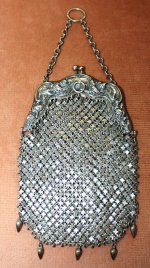 875359fe56fc7c4d58824223741f3be0--silver-bags-silver-purses.jpg