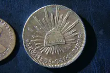 8reales_front.webp