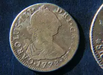 2reales_front.webp