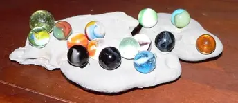 marbles on rock.webp