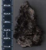 Raw Ore 2 after heat test w molten droplets.jpg