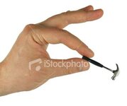 ist2_5468342-hand-holding-small-hammer.jpg