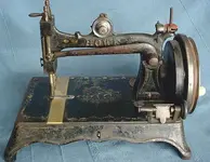 sewing machine howe.webp