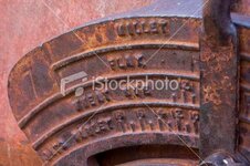 ist2_6632983-rusty-dial-with-grain-selection-on-vintage-seed-planter.jpg