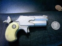 Toy Pistol with cocked hammer.jpg