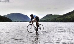 british_teenager_bikes_on_top_of_water_for_charity_wont_say_how.jpg