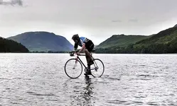 british_teenager_bikes_on_top_of_water_for_charity_wont_say_how.webp