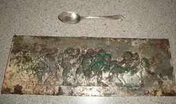 Metal Plate and Sterling Spoon.webp