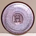 cartridge_headstamp_H-with-odd-serifs_44Winchester-Henry.webp