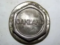 antique-early-1900s-oakland-car-metal-hubcap_150636851007.webp