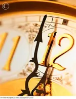 antique_clock_with_hands_close_to_midnight_700-00604626.webp