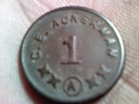 C.E. Akerman ingle system token front.jpg